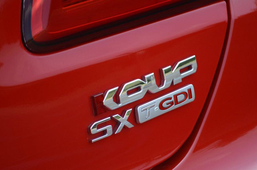 Kia Forte Koup SX 2014 года  (фото 18 из 36)